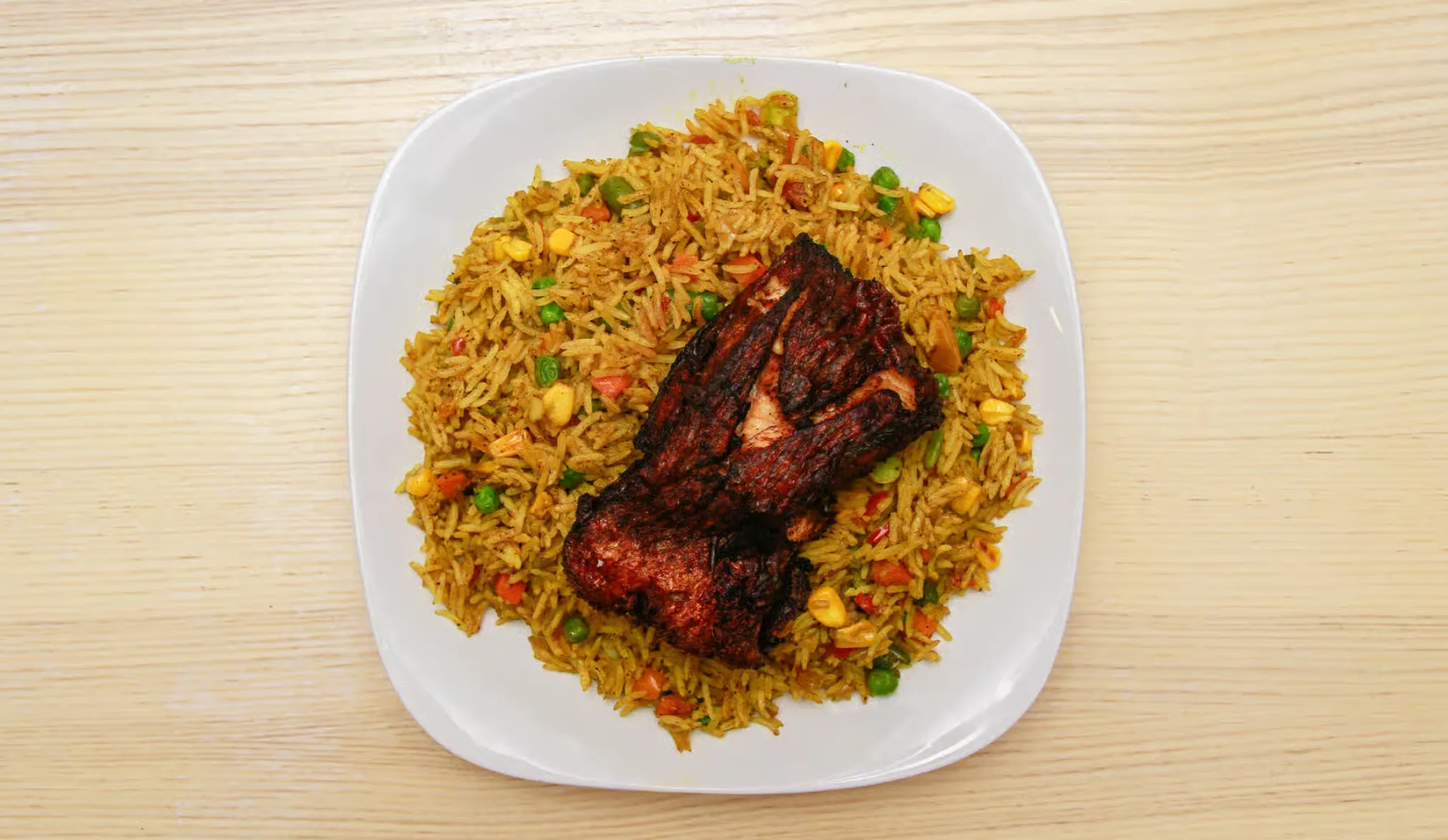 Delicious Fried Rice at Loo Afro Naija Cuisine Nigerian Restaurant in Edmonton, AB